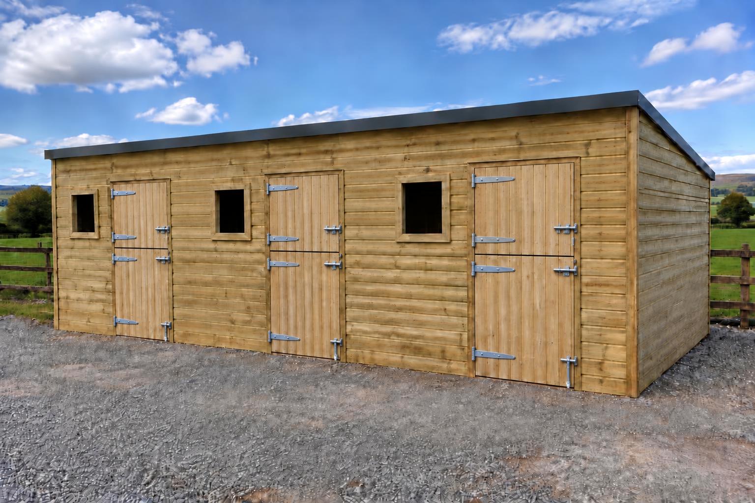 Three-stable block with level front fascia and a front-to-back mono-pitch roof